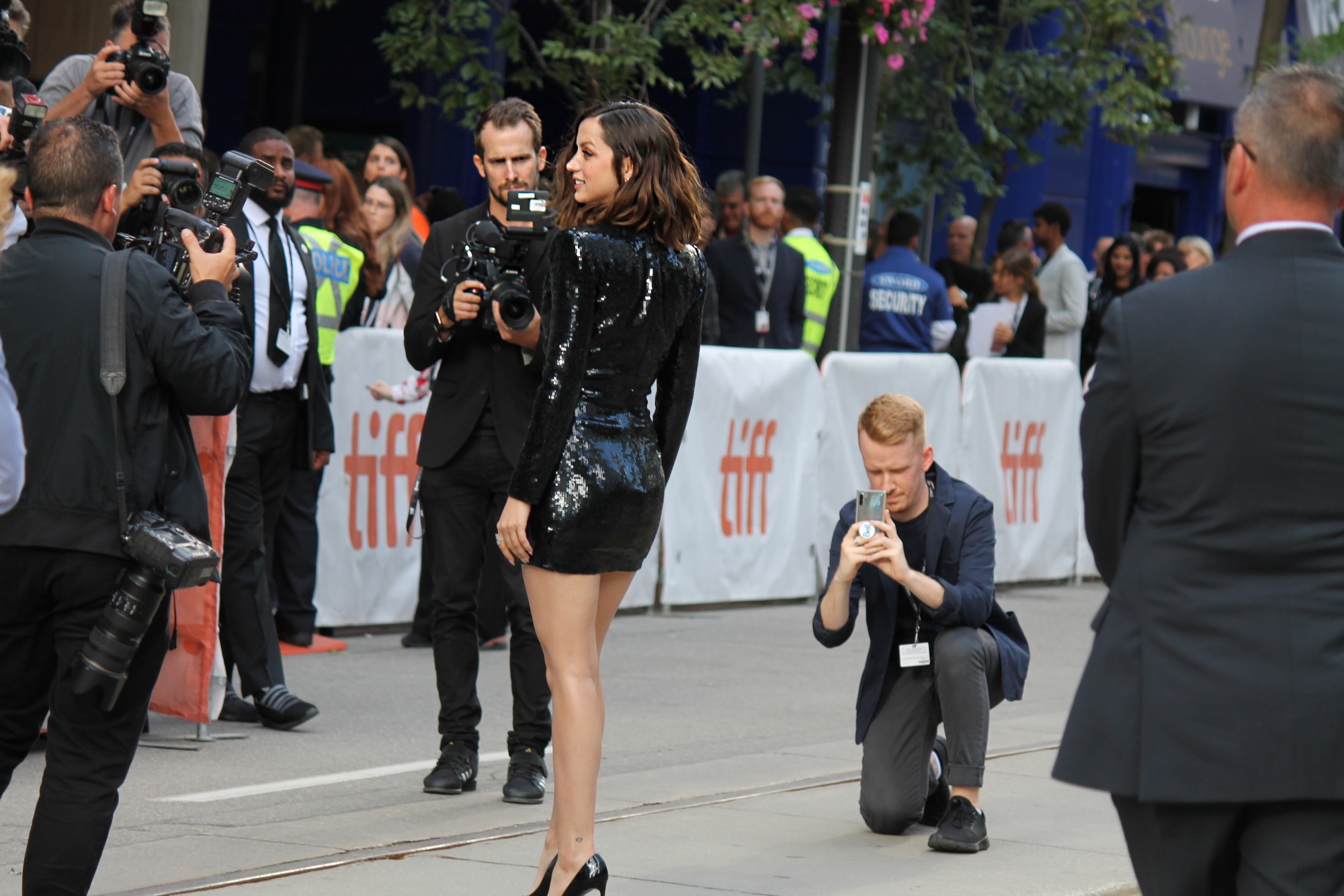 Bautiful Ana de Armas wearing a tight fitting black mini dress at TIFF