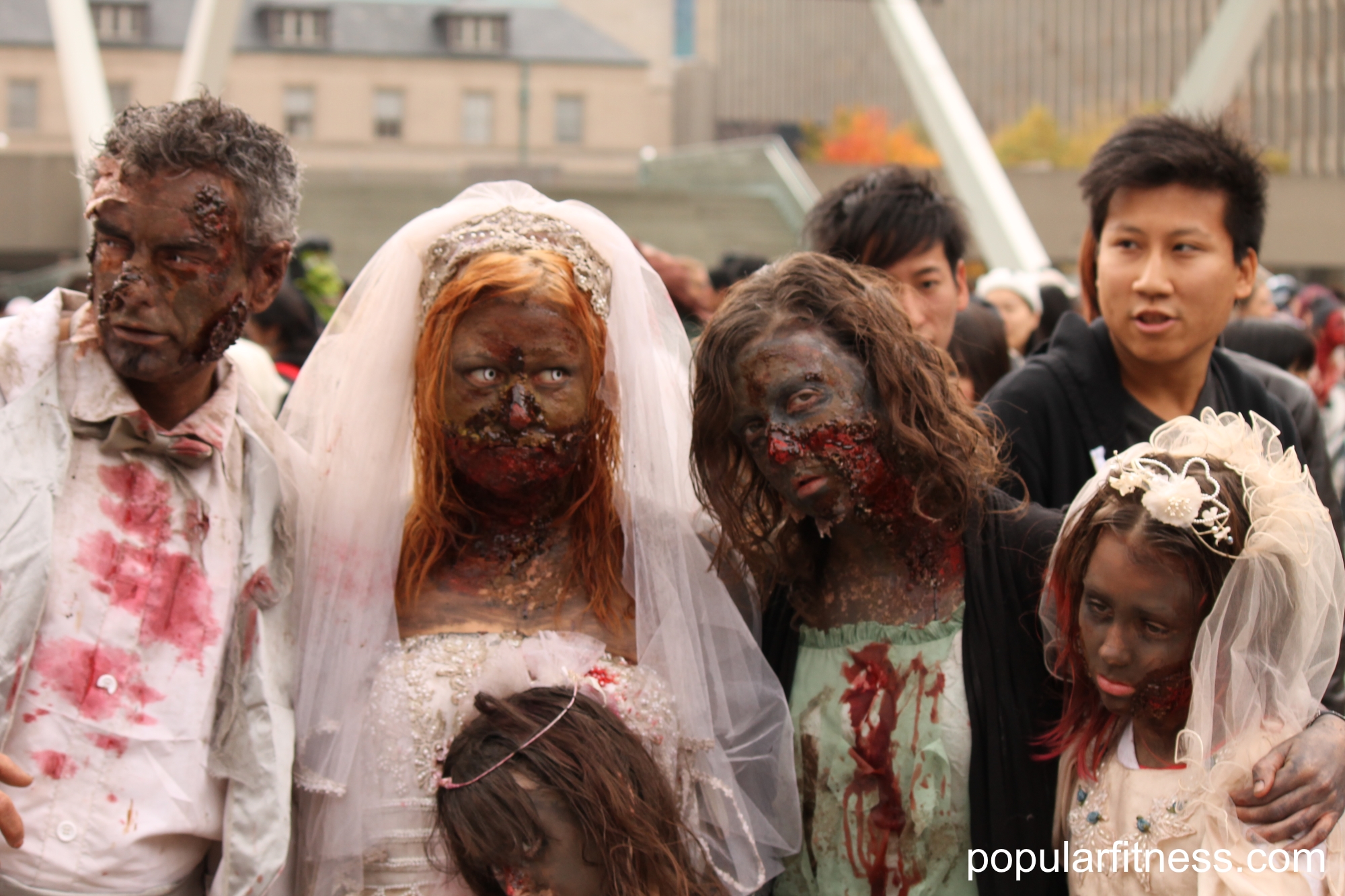 A Zombie family wedding - zombie groom, bride and the zombie kids